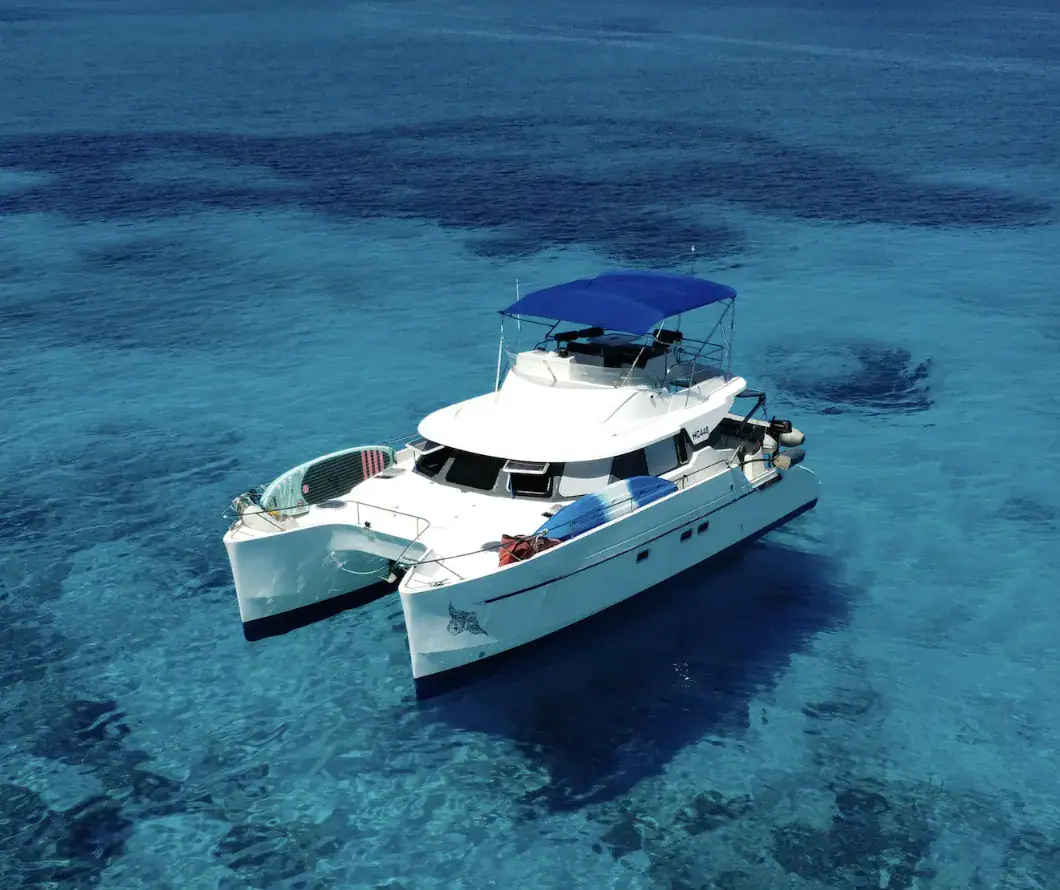 Luxury yacht sailing in clear blue waters. African Banks