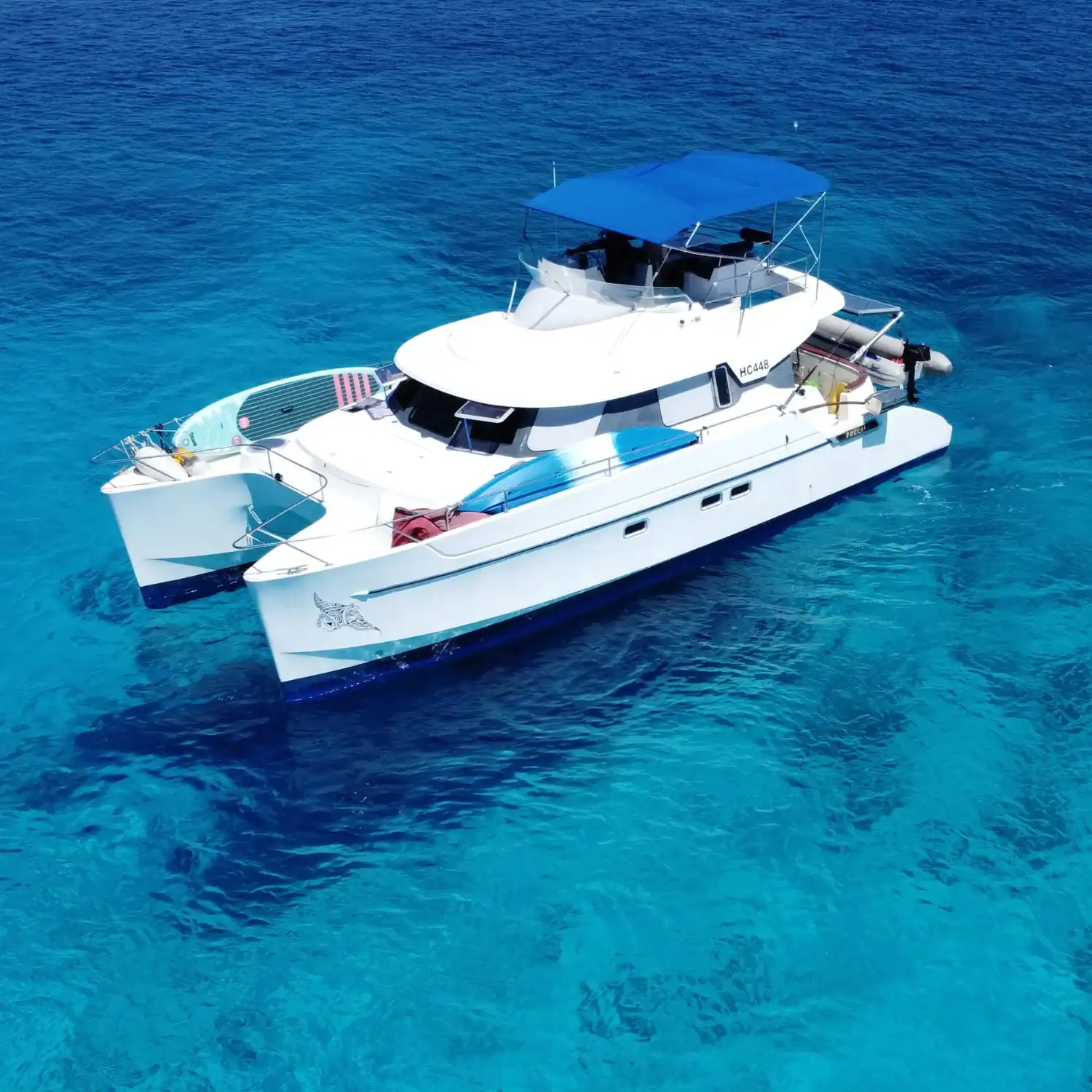 Yacht for Seychelles fishing trips Fontaine Pajot Maryland 37 power catamaran resting offshore in Amirantes trench