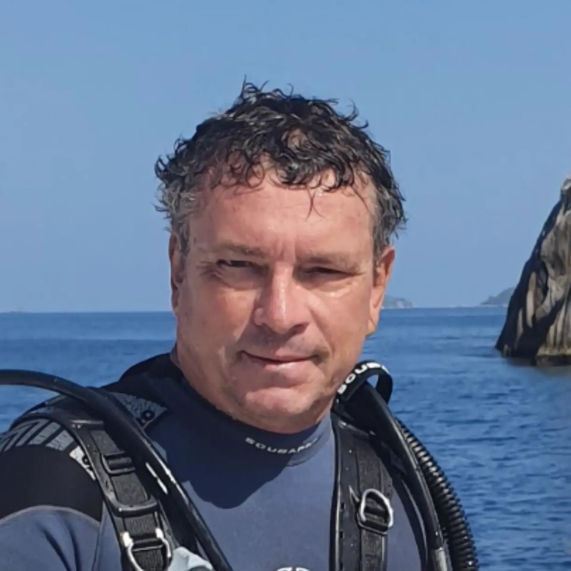 Scuba Diver at Sea | Screaming Reels Captain Frederic Moinet in Amirantes